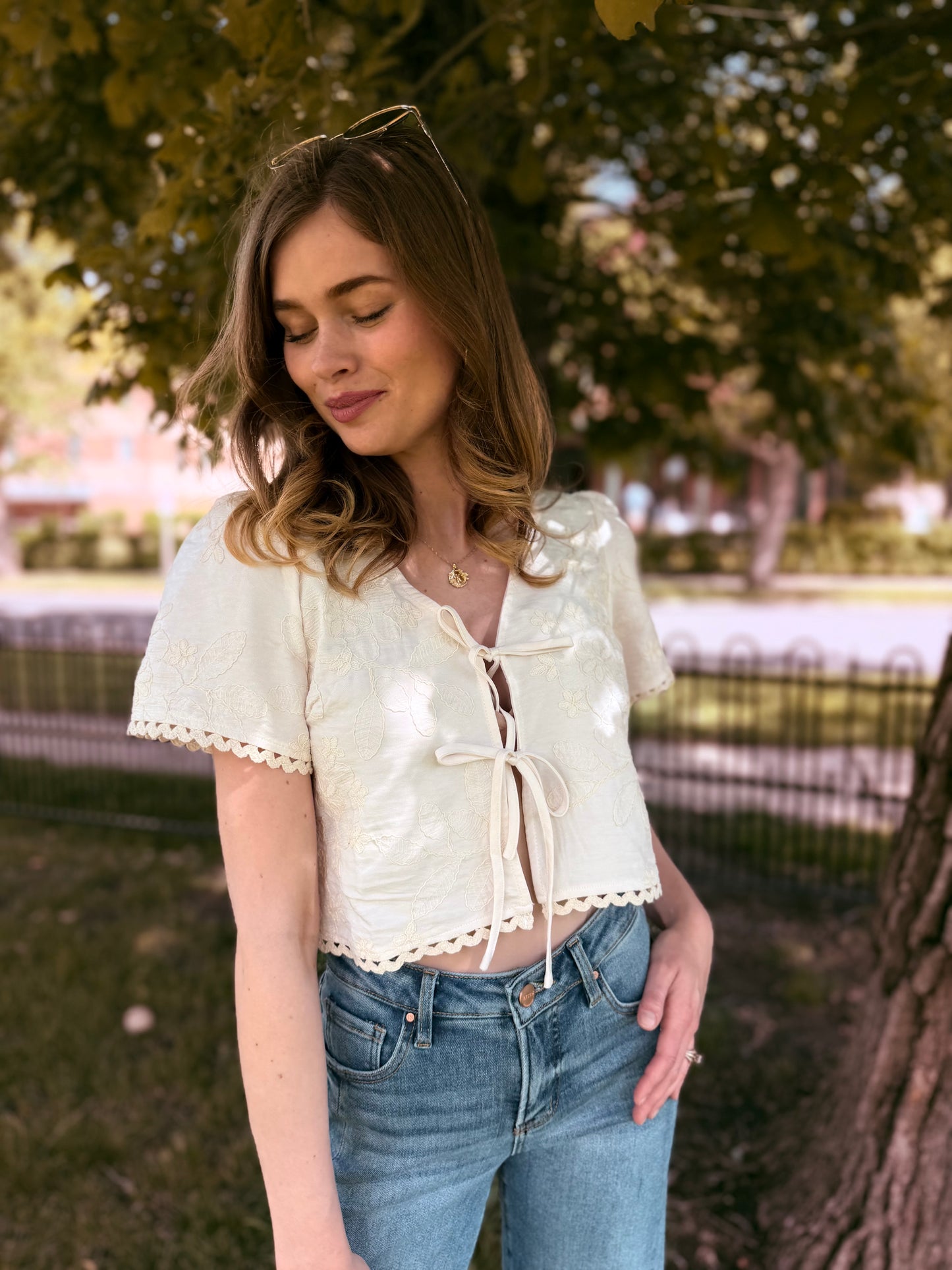 Embroidered Pattern Front Tie Wavy Trim Top