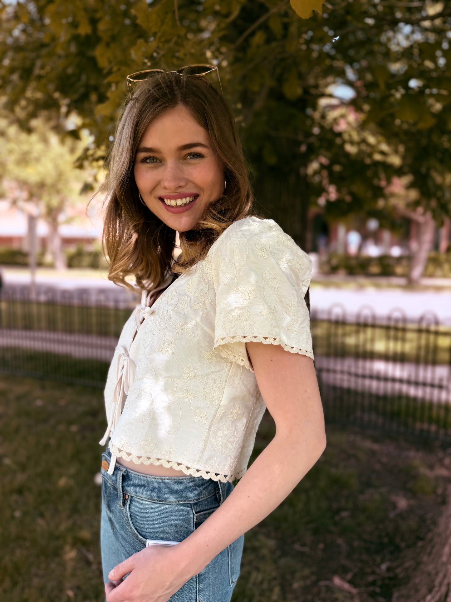 Embroidered Pattern Front Tie Wavy Trim Top