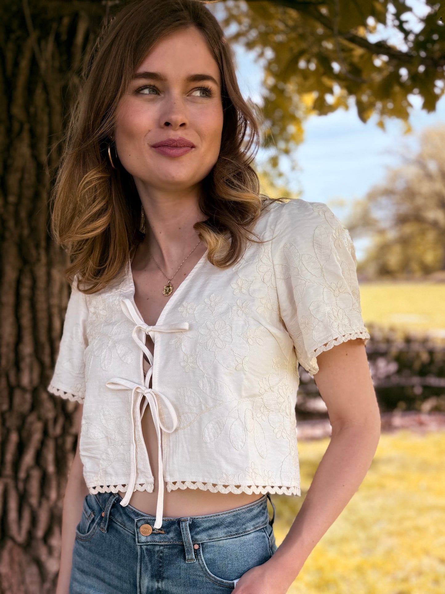 Embroidered Pattern Front Tie Wavy Trim Top