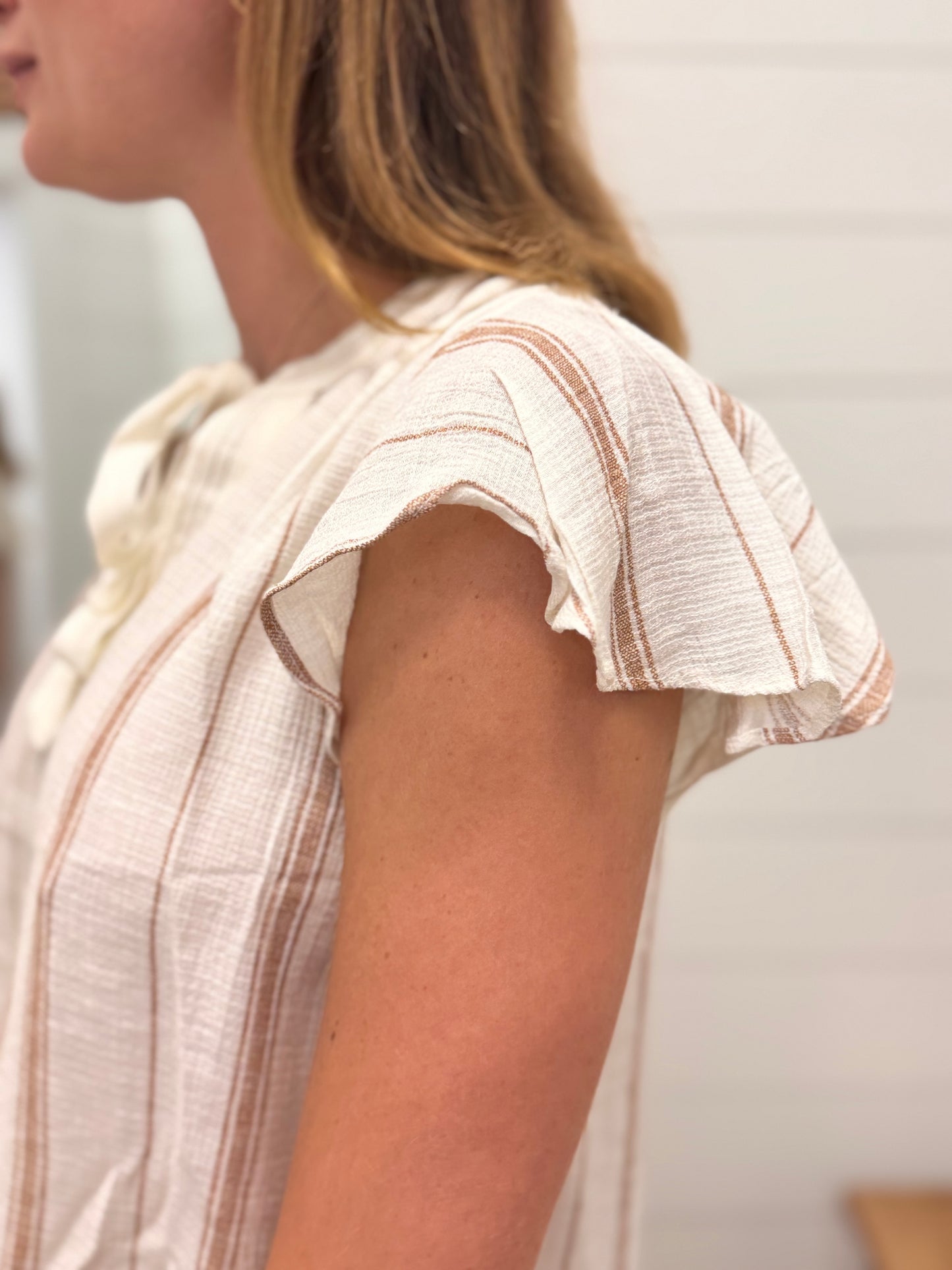 Top with mini v + tie closure