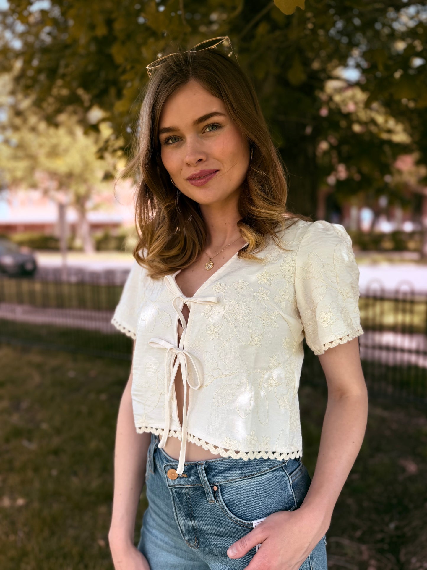 Embroidered Pattern Front Tie Wavy Trim Top