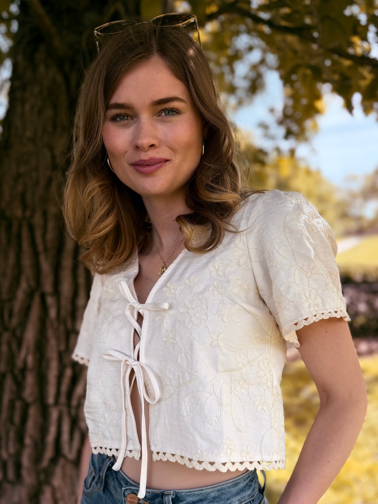 Embroidered Pattern Front Tie Wavy Trim Top